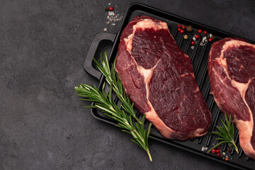 fresh raw beef ribeye steaks