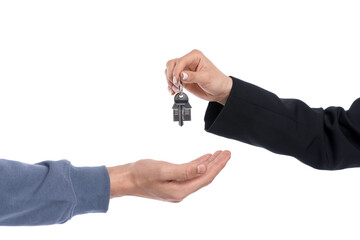 Real estate agent giving house key to new owner on white background, closeup