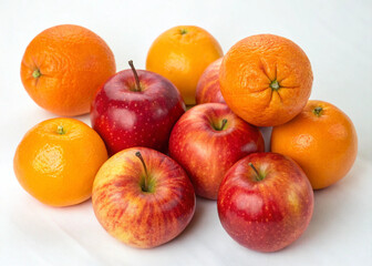 oranges and apples on white background