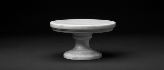 Elegant White Marble Pedestal Stand Against Black Backdrop for Product Display and Minimalist Presentation in Studio Lighting