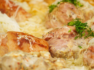 Many pork knuckle in big pot.
