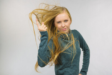 Woman pointing finger displeased