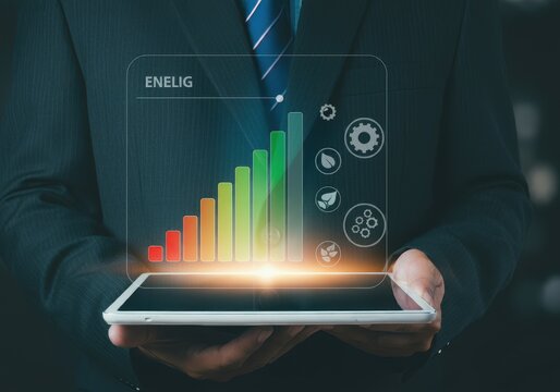 Man holding tablet displaying energy efficiency chart and environmental icons