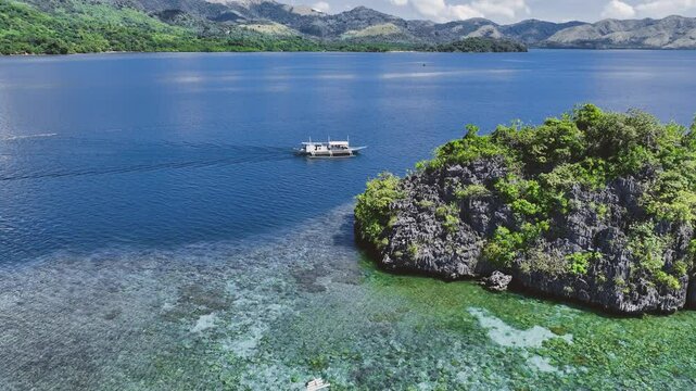 4K Drone View Of Seven Islands of Siete Pecados, Coron island, Palawan, Philippines
showcases the cluster of seven distinct islands surrounded by vibrant blue and crystal clear waters
