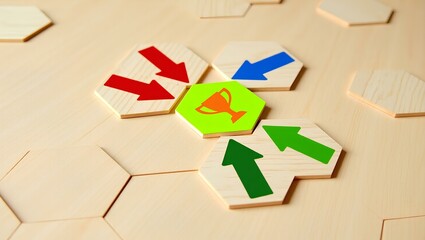 Reaching the Trophy: Strategic Arrows on Hexagonal Tiles.