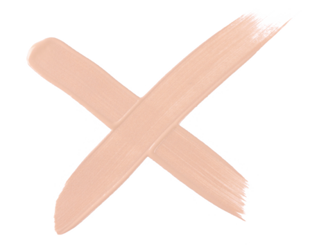 Bright beige smear of foundation in the form of a cross isolated on a white background