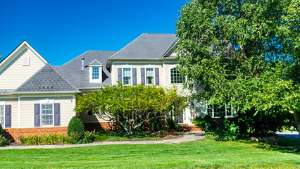 luxury house in summer with green trees and nice landscape.