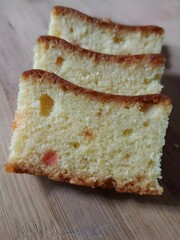 Moist and fluffy vanilla cake slices with a golden crust – a classic homemade dessert for all occasions.