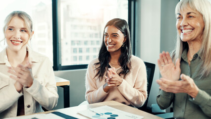 Fototapeta premium Women, applause and team at meeting in office with smile, goals and support with celebration at startup. Business people, cheers and success with achievement, profit and excited at creative agency