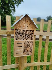 Charming Wooden Insect Hotel: An Eco-Friendly Haven to Support Garden Biodiversity and Wild Bees
