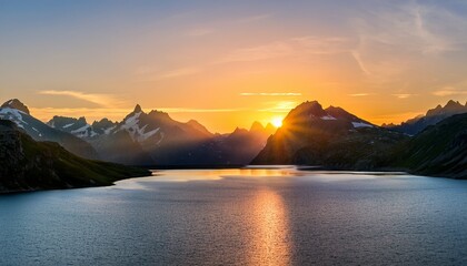 sunrise over mountains and lake