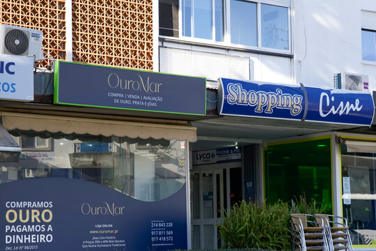Shopping Cisse storefront with OuroNar sign in a vibrant urban setting showcasing local businesses and inviting atmosphere for shopping experience concept