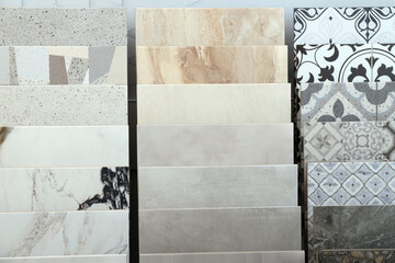 Many different samples of tiles on display in store