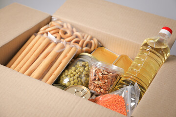 Many different food products in box, closeup