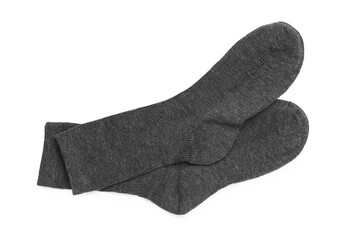 Pair of grey socks isolated on white, top view