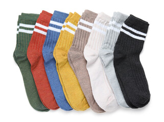 Many different pairs of socks isolated on white, top view