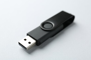 One flash drive on white background, closeup