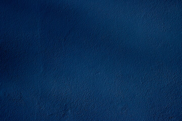Blue colored abstract wall background with textures of different shades of blue