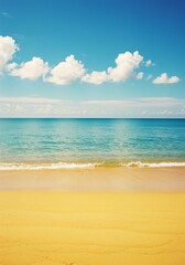 Fototapeta premium Serene Tropical Beach Scene Golden Sand, Azure Waters, and Blue Sky