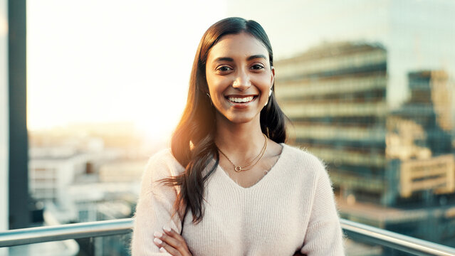 City, rooftop and portrait with business woman outdoor for ambition, inspiration or opportunity. Arms crossed, buildings and smile with happy employee in urban town for internship or new job