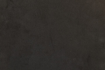 Black porous soft texture rug, top view, background