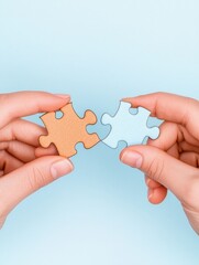 Connecting Pastel Puzzle Pieces Hands Joining Two Pieces on Light Blue Background
