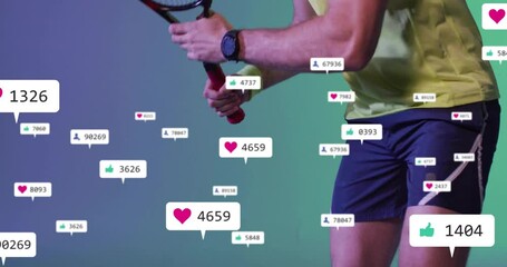 Male tennis player swinging racket in marketing set, showing social media like and follower icons - Powered by Adobe