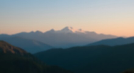 Fototapeta premium Background shows soft sunset colors over distant mountains and rolling, out-of-focus green hills.