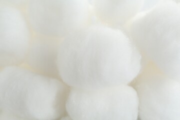 Many fluffy cotton balls as background, closeup