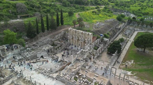 Wide amphitheater with central stage and ruins in aerial Turkey landscape