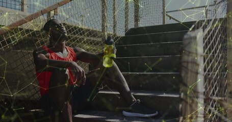 Image of network of connections over african american sportsman