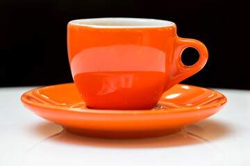 Orange espresso coffee cup