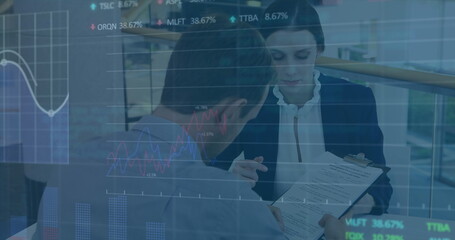 Image of financial data processing and stock market over diverse business people