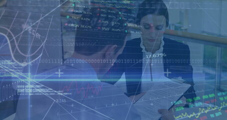 Image of financial data processing and stock market over diverse business people