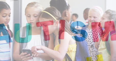 Image of autism text over diverse schoolchildren using smartphone © vectorfusionart