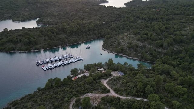 Drone footage of ACI Marina Palmizana with yachts and sunset view