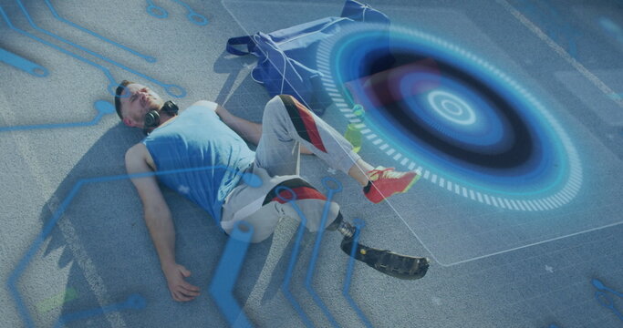 Image of data processing over disabled caucasian sportsman