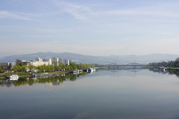 Obraz premium A riverside embankment in Linz, the river Danube, Austria 