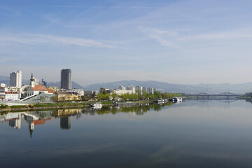 Obraz premium A riverside embankment in Linz, the river Danube, Austria 