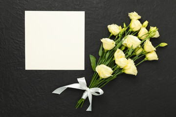 Beautiful bouquet with eustoma flowers on concrete background, top view