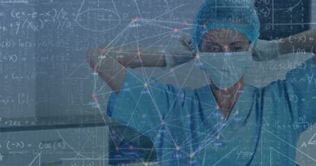 Image of scientific equations over caucasian surgeon in face mask