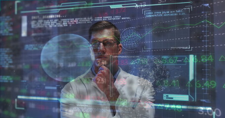 Image of cells and data over caucasian male doctor