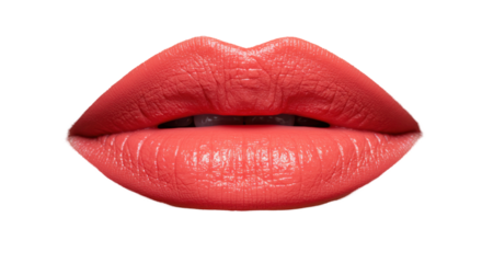Close-up of full, coral-colored lips against a black background, highlighting texture and shape