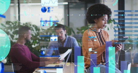 Statistical data processing against thoughtful african american woman using digital tablet at office