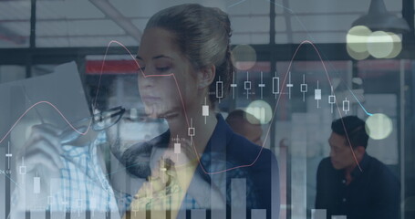 Image of financial data processing over caucasian businesswoman