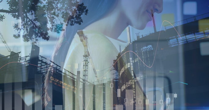 Image of financial data processing over caucasian businesswoman