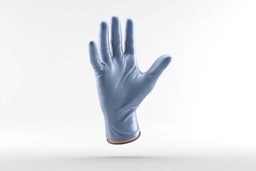 Fototapeta premium A shiny blue surgical glove, inflated and posed against a bright white background, ready for medical examination, clean hands or lab work in healthcare setting.