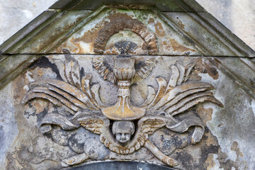 Historic Statue on the spring mystery old Prague Cemetery, Czech Republic 