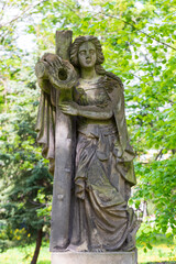 Fototapeta premium Historic Statue on the spring mystery old Prague Cemetery, Czech Republic 