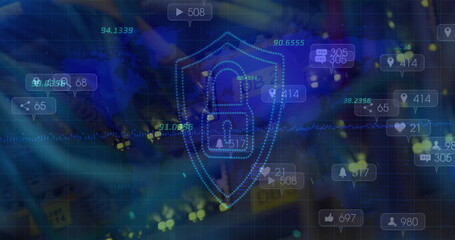 Multiple numbers over security shield and padlock icon against close up of a computer server